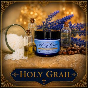 Holy Grail whipped tallow cream by Immaculate Tallow surrounded by lavender, natural oils, sea salt, and botanical ingredients in a luxury skincare display.